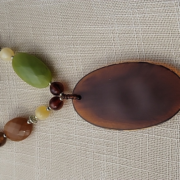 Earthy Green and Brown Beaded Necklace with Oval Pendant And Clip On Earings - Picture 2 of 3